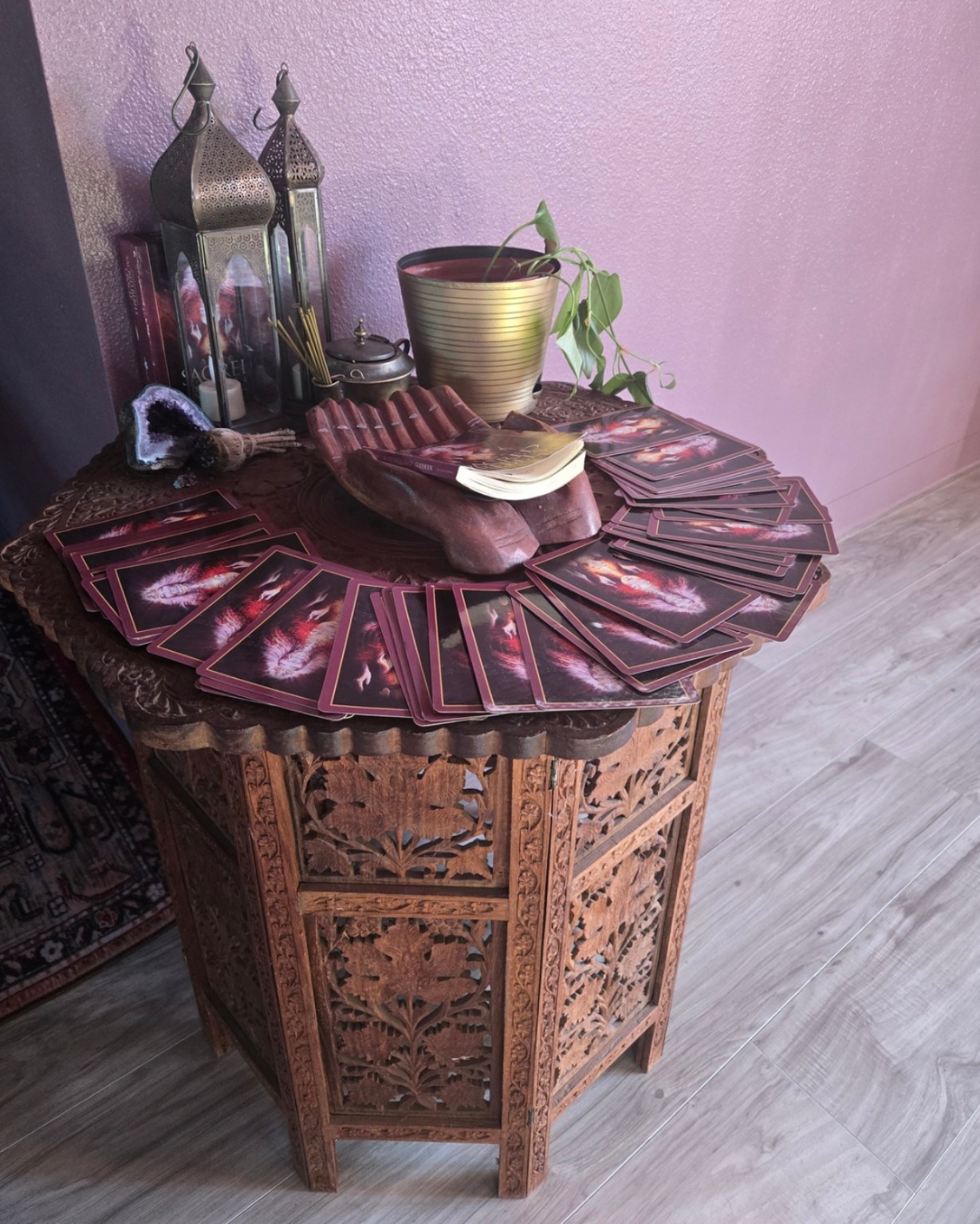 Astrology and Human Design card table at Cricks Chiropractic & Acupuncture