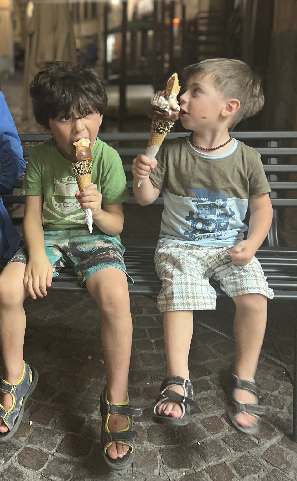 Two children enjoying ice cream